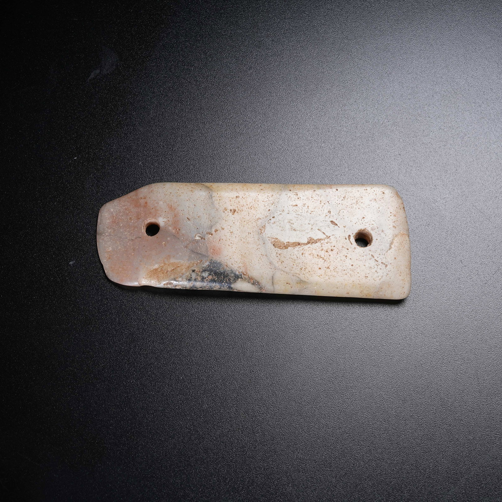 A ANCIENT JADE TWO-HOLE BLADE: Ancient Jade Two-hole Blade
