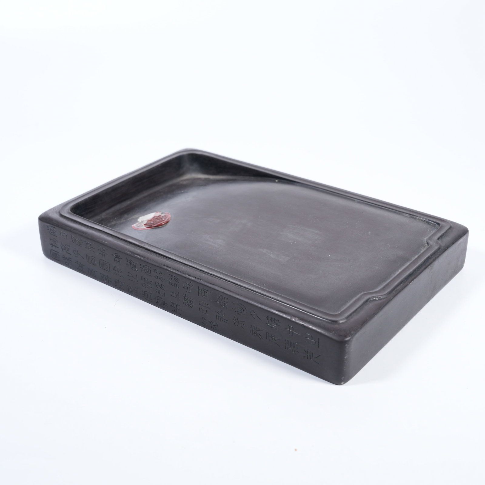 A DUAN-STONE INKSTONE WITH POETIC INSCRIPTIONS: Duan-stone inkstone with poetic inscriptions