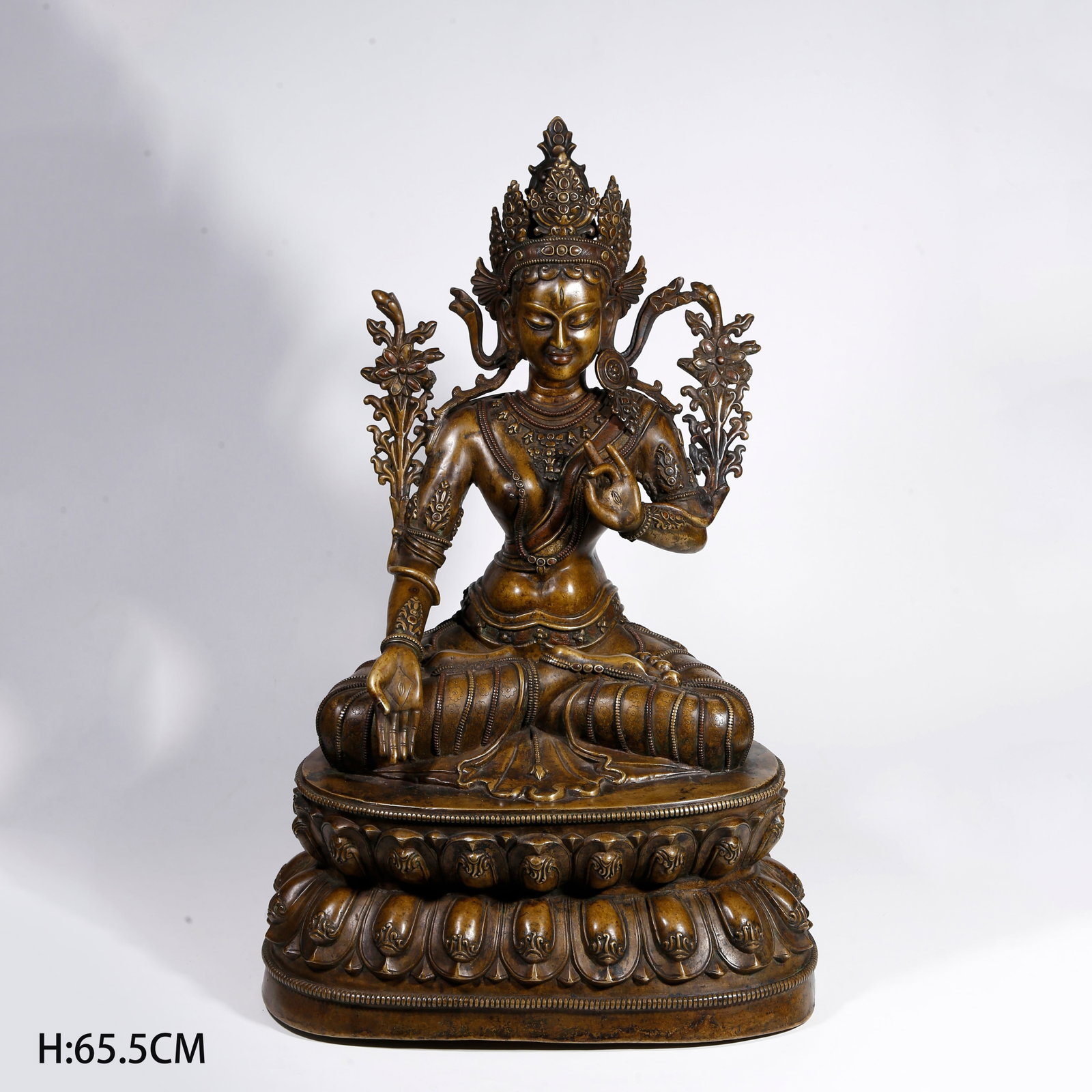 A BRONZE TARA STATUE (1 of 9)