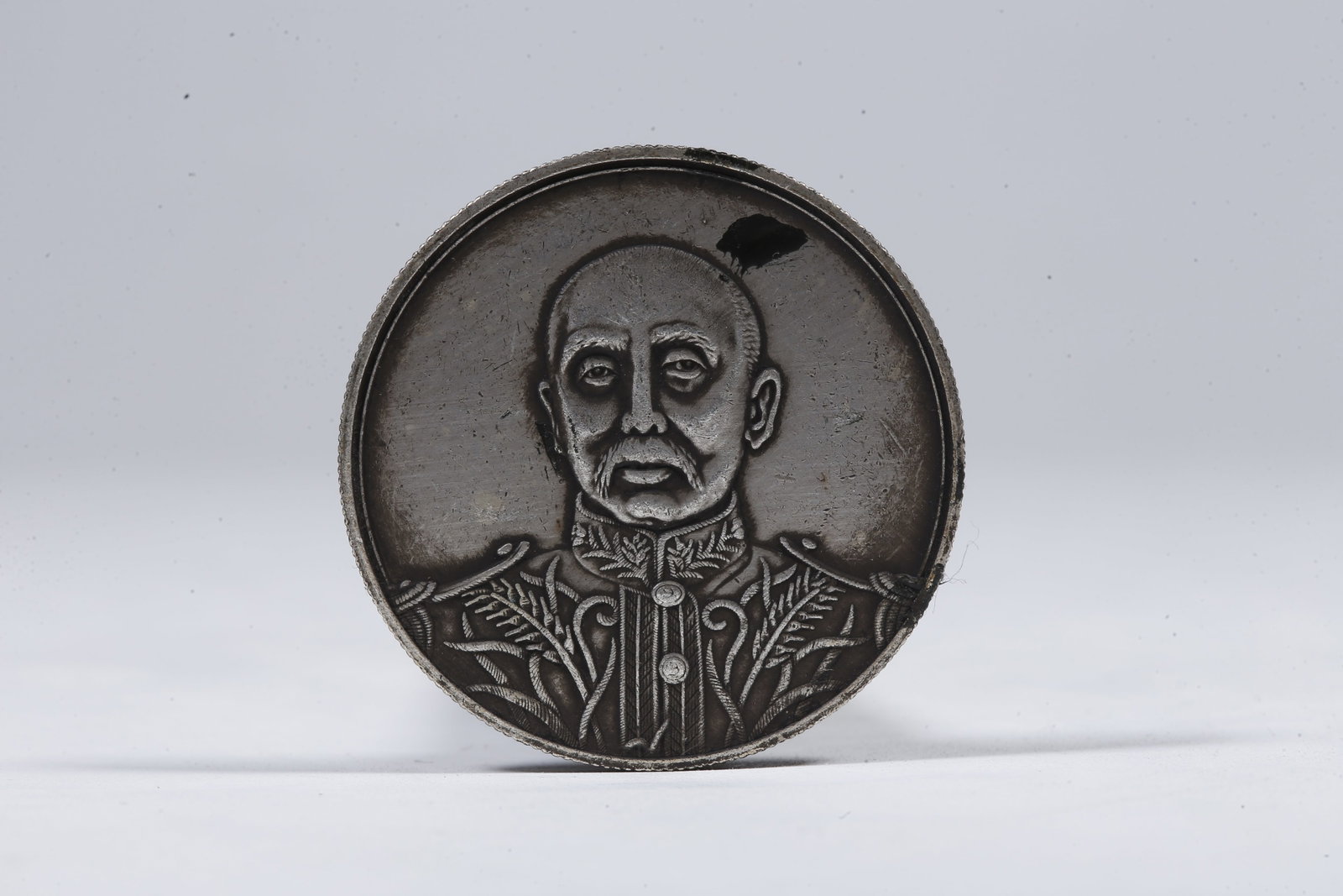 A SILVER DOLLAR COIN - 3