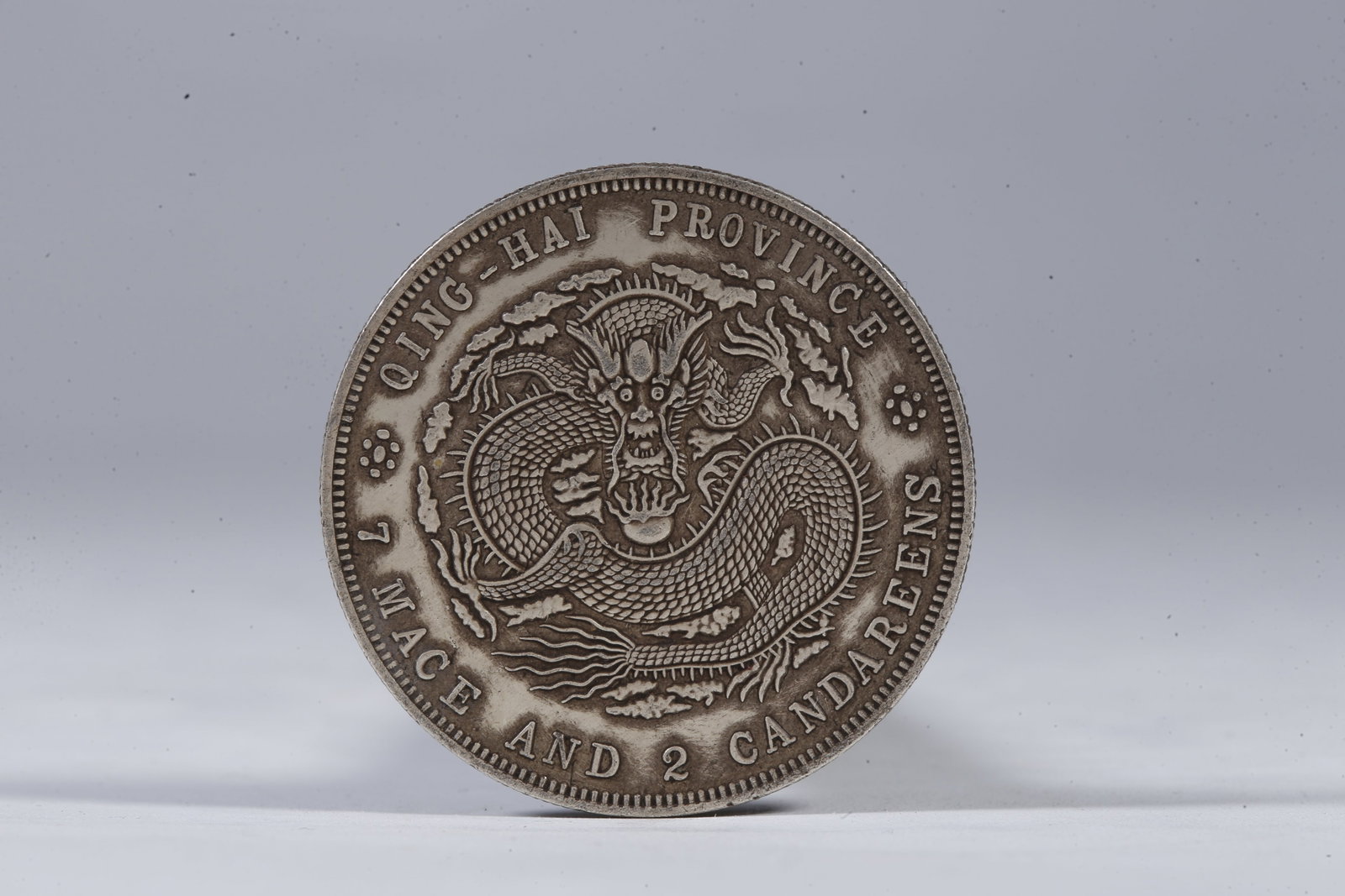 A SILVER DOLLAR COIN - 3