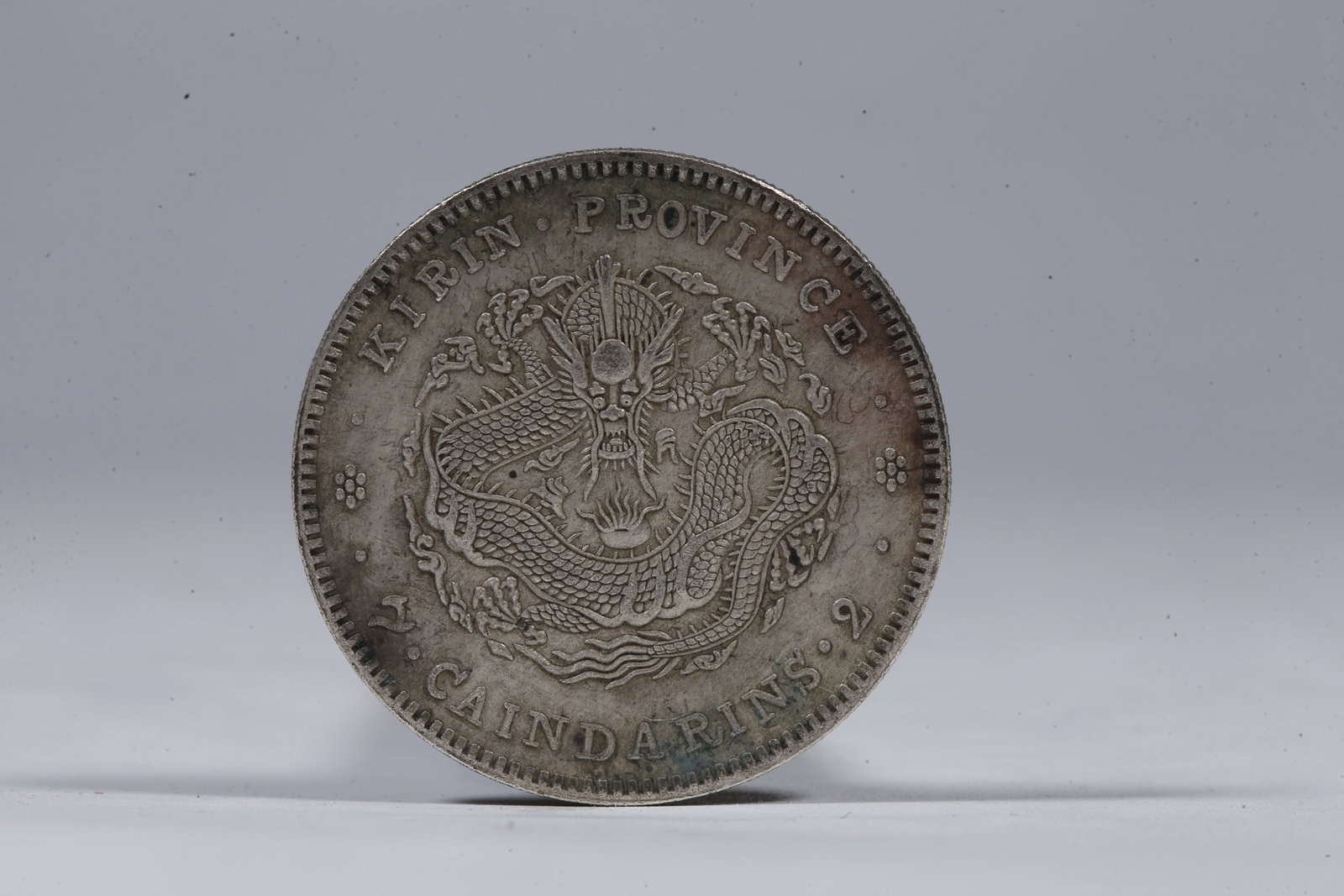 A SILVER DOLLAR COIN - 3