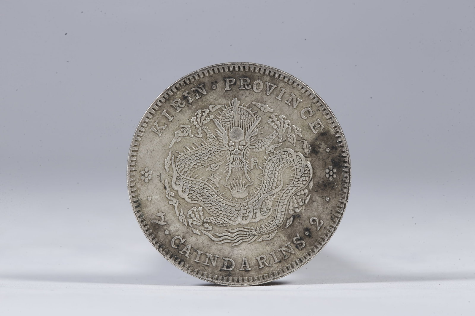 A SILVER DOLLAR COIN - 3