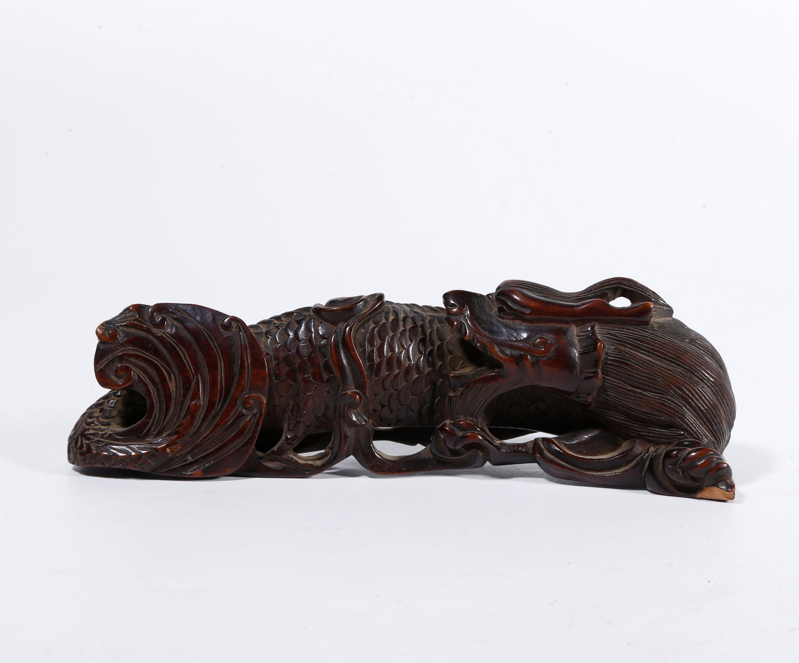 A BOXWOOD CARVED DRAGON-FORM ORNAMENT (1 of 9)