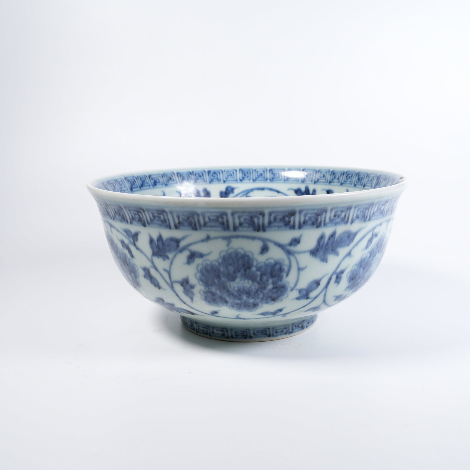 A BLUE-AND-WHITE BOWL WITH FLORAL PATTERN (1 of 9)
