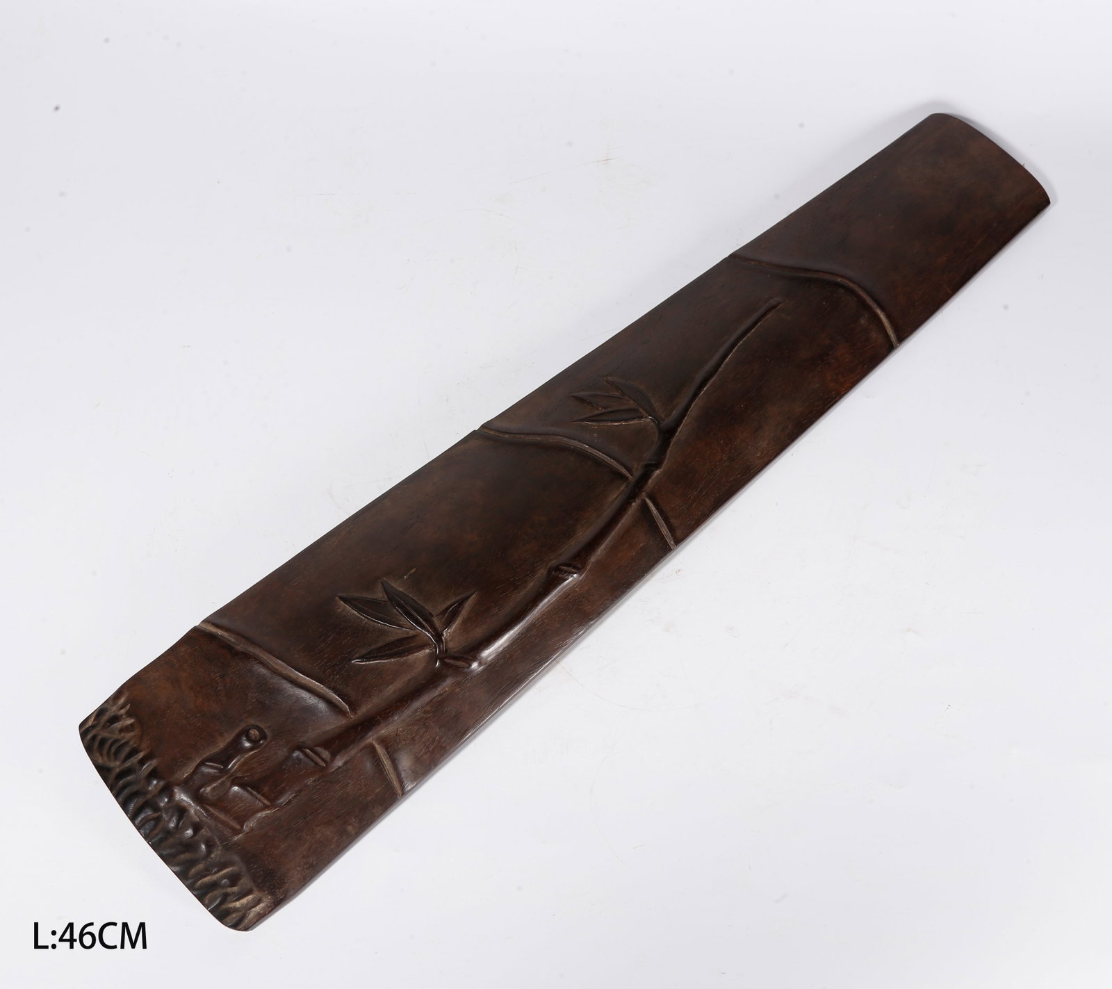 A BAMBOO-SEGMENT-SHAPED WRIST REST CARVED IN ZITAN WOOD (1 of 8)