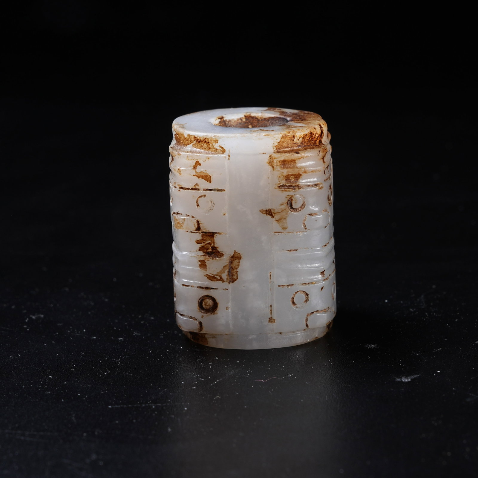 A ARCHAIC JADE CONG WITH DEITY FACE MOTIF: Archaic Jade Cong with Deity Face Motif