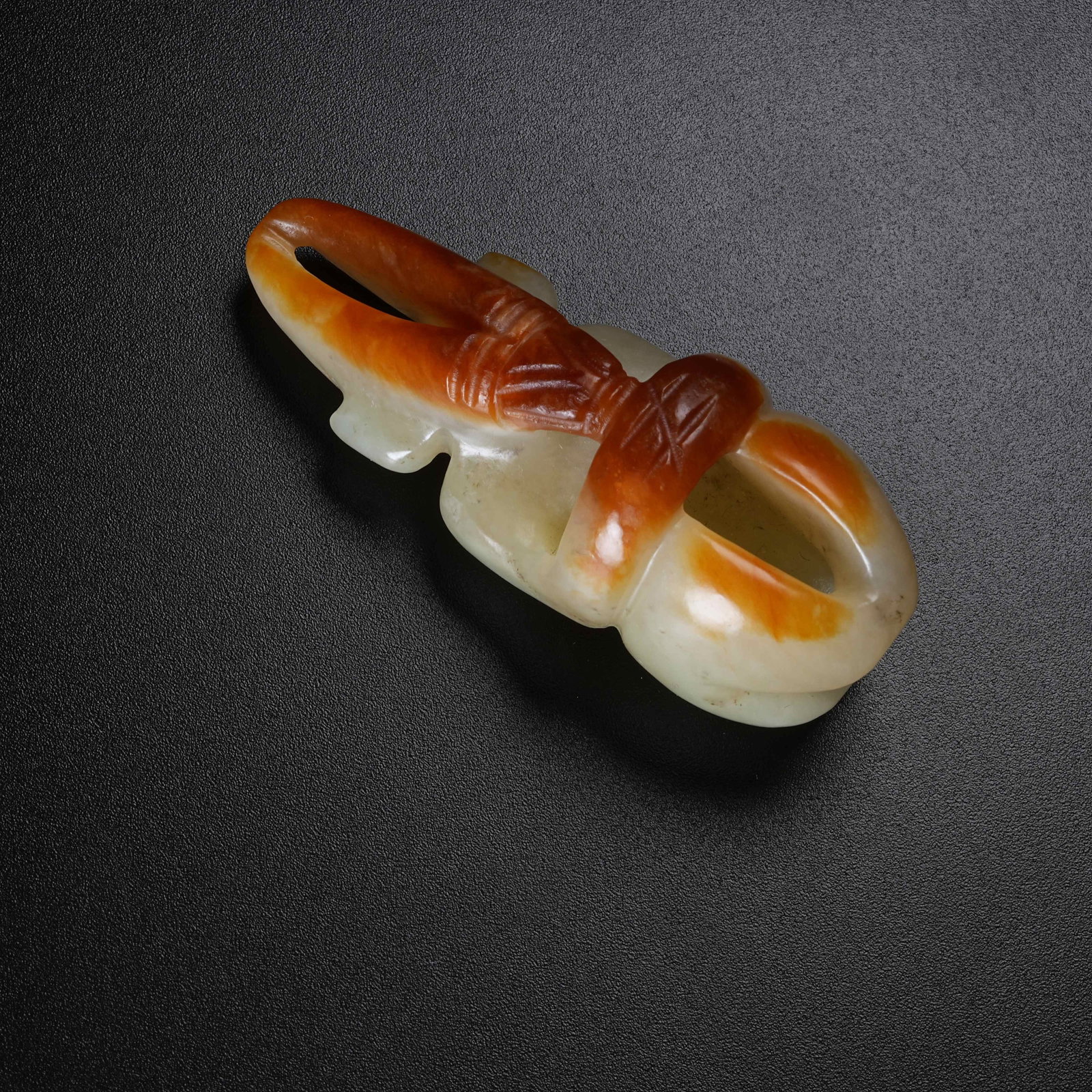 A ANCIENT JADE SUN GOD PENDANT (1 of 8)