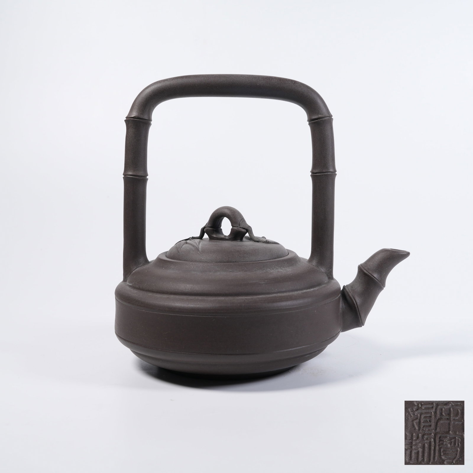 A YIXING CLAY LIFTING-POT WITH BAMBOO KNOB (1 of 9)