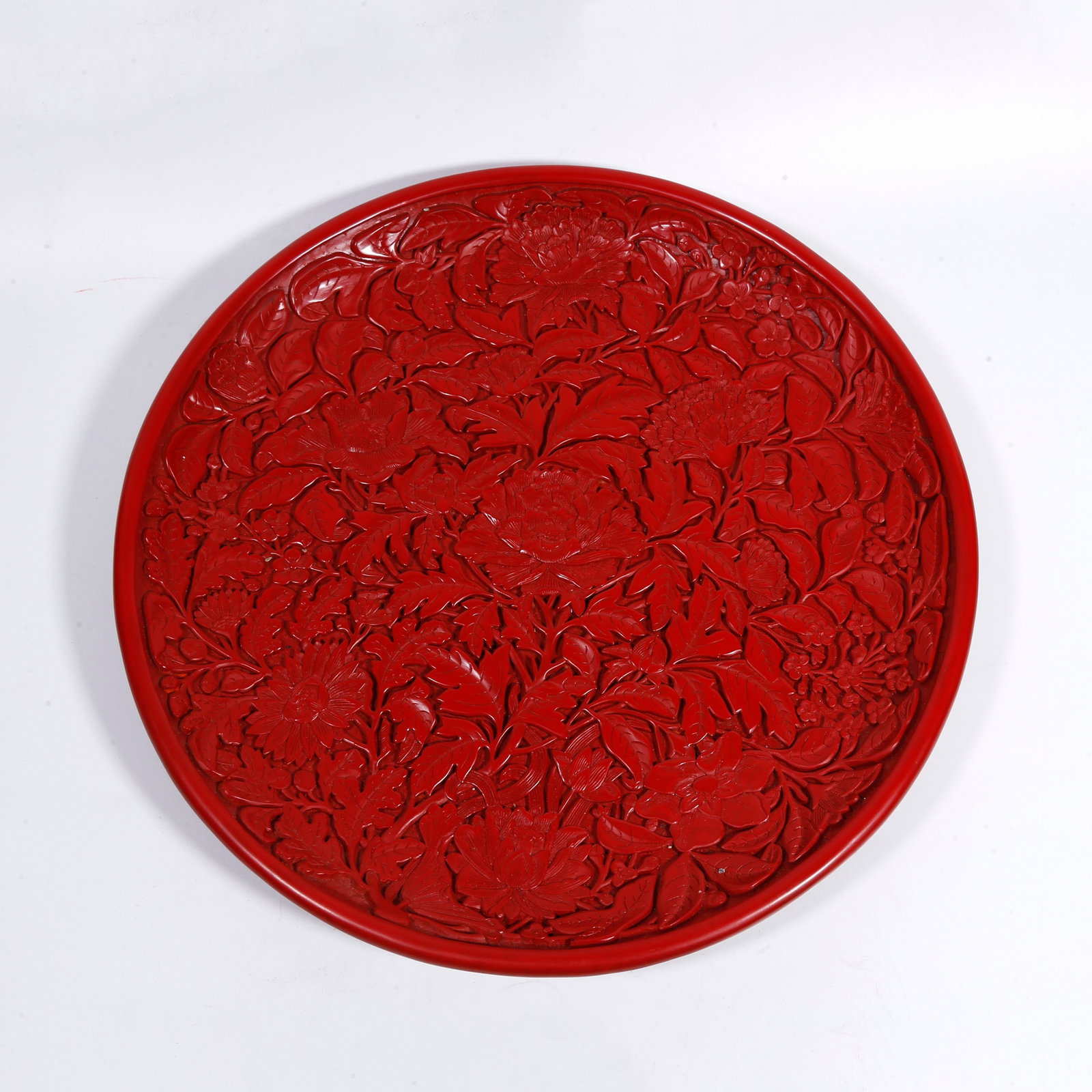 A CARVED-RED PLATE WITH FLOWER PATTERN (1 of 10)