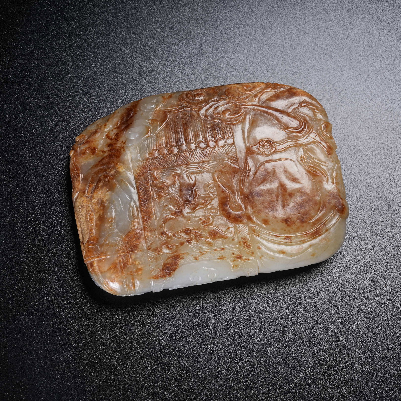 A HETIAN JADE BELT ORNAMENT WITH HUMAN FIGURE PATTERN: Hetian Jade Belt Ornament with Human Figure Pattern