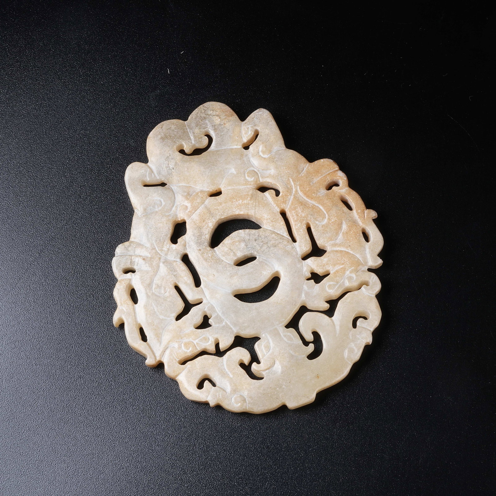 A ARCHAIC JADE PENDANT WITH BEAST PATTERN (1 of 9)