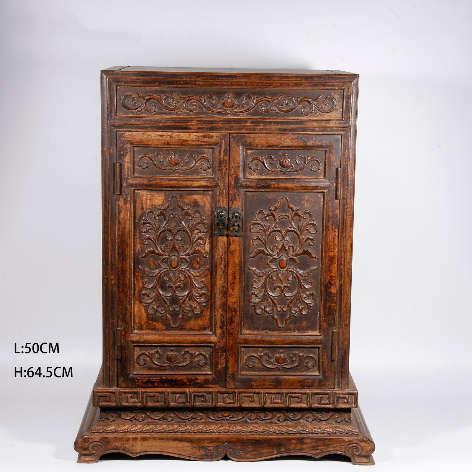 A SMALL CABINET CARVED WITH FLOWER PATTERN IN HUANGHUALI WOOD (1 of 10)