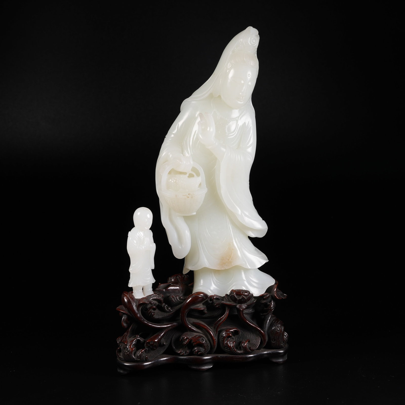 A STANDING ORNAMENT OF BOY WORSHIPPING GUANYIN IN WHITE HETIAN JADE (1 of 7)