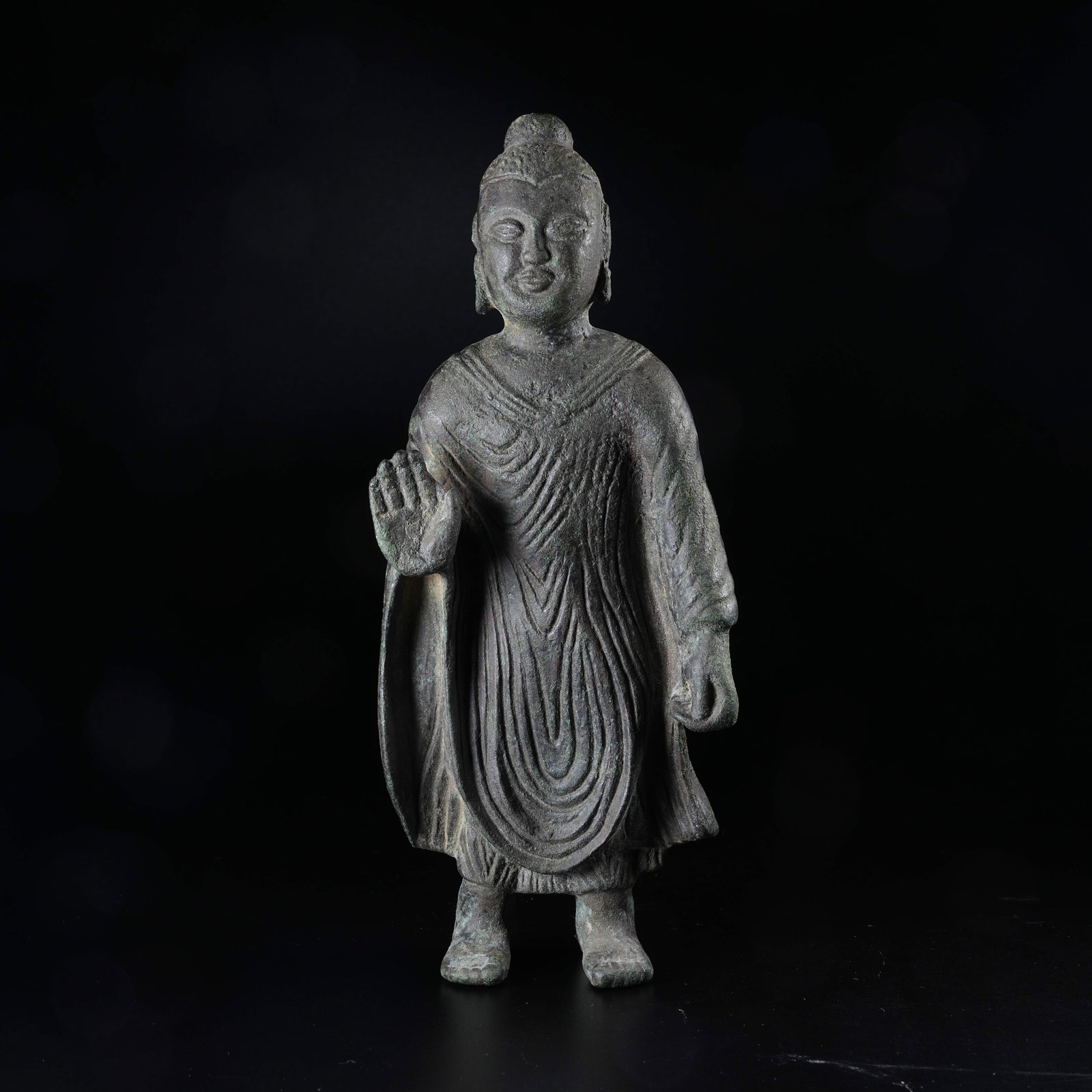 A STANDING BRONZE BUDDHA STATUE: Standing Bronze Buddha Statue