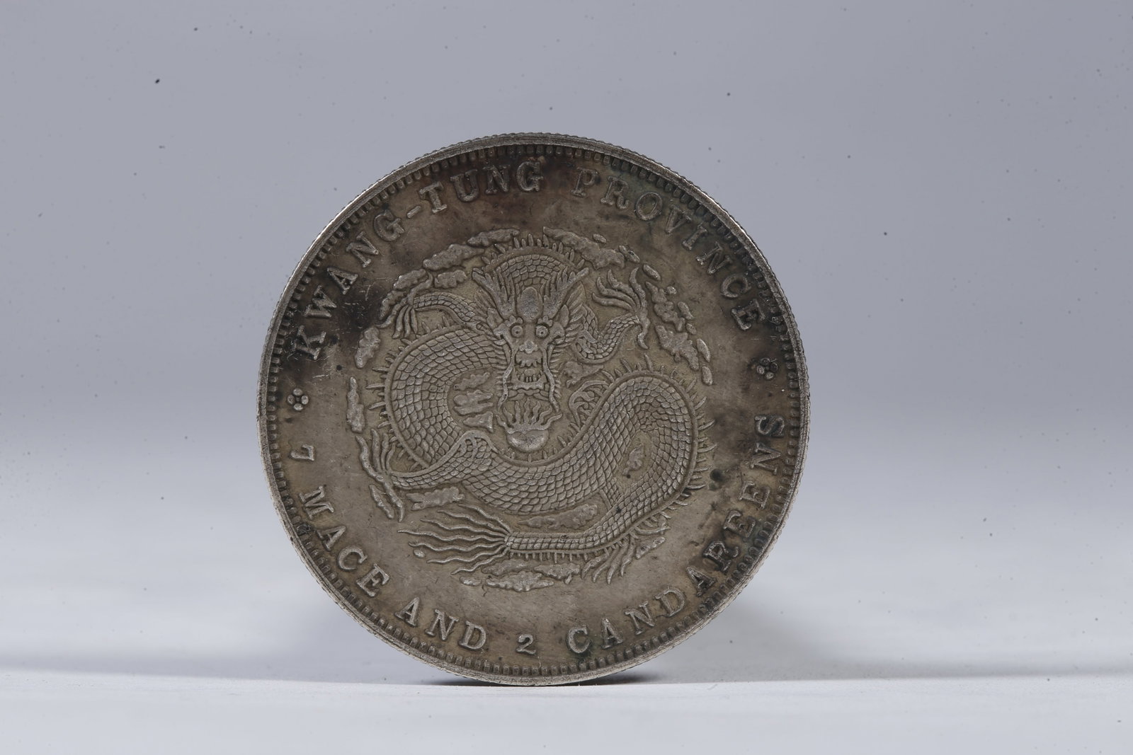 A SILVER DOLLAR COIN - 3