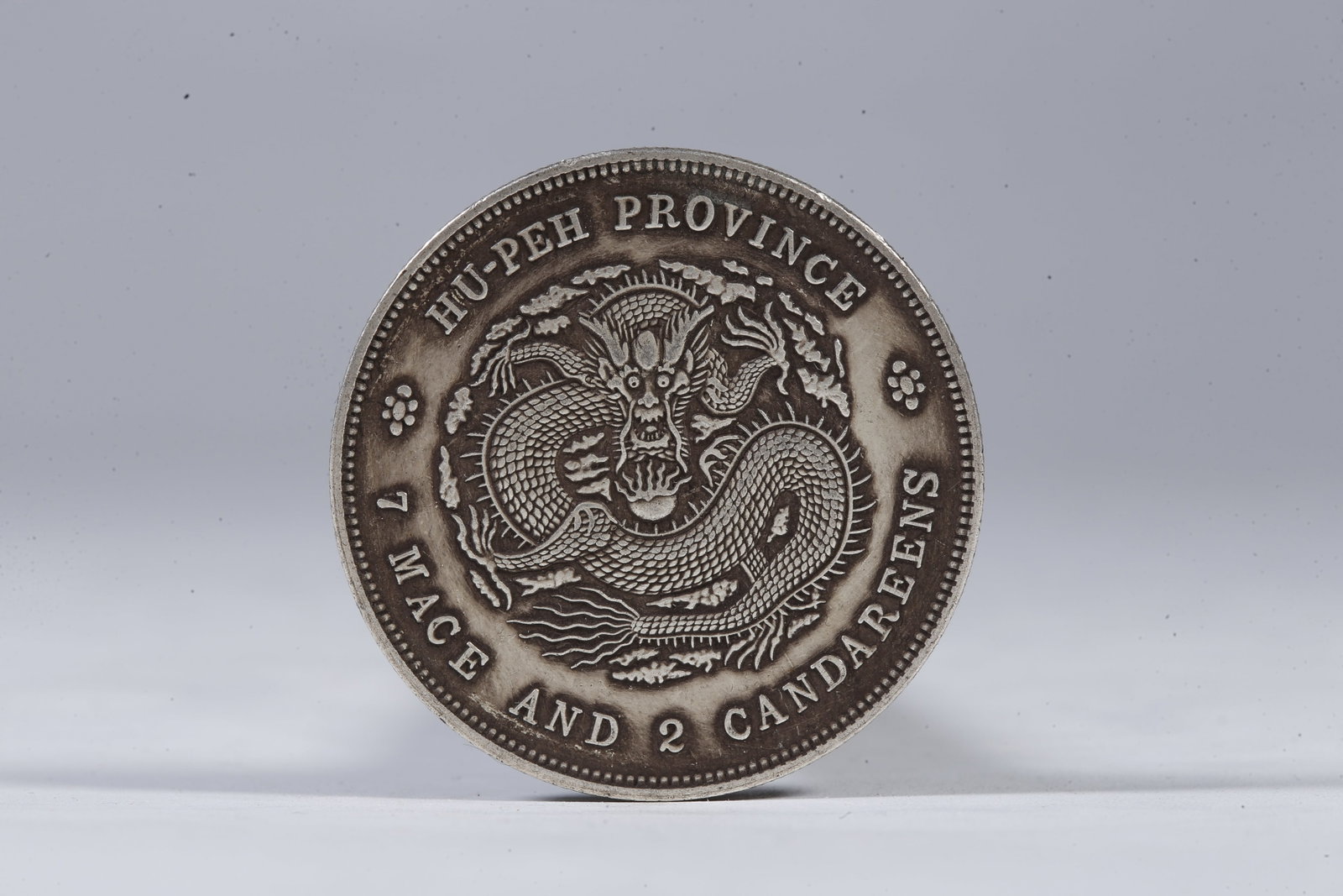 A SILVER DOLLAR COIN - 3