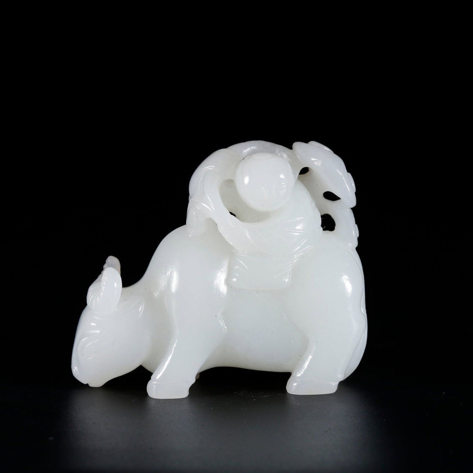 A HETIAN JADE ORNAMENT CARVED AS BOY HERDING OX (1 of 9)