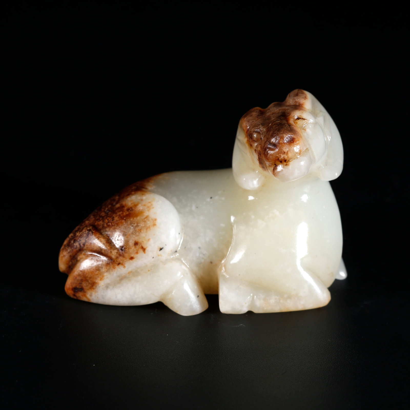 A HETIAN JADE ORNAMENT CARVED AS BEAST (1 of 9)