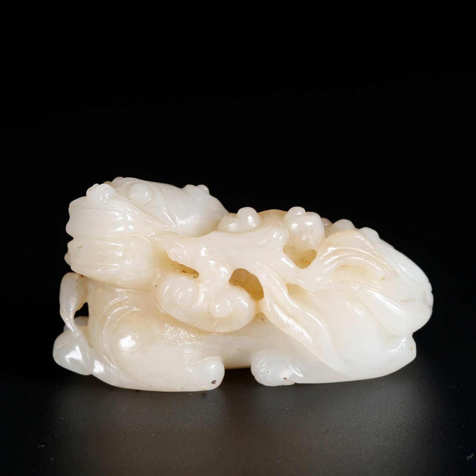 A ORNAMENT CARVED WITH BEAST MOTIFS OF HETIAN JADE: Ornament Carved with Beast Motifs of Hetian Jade