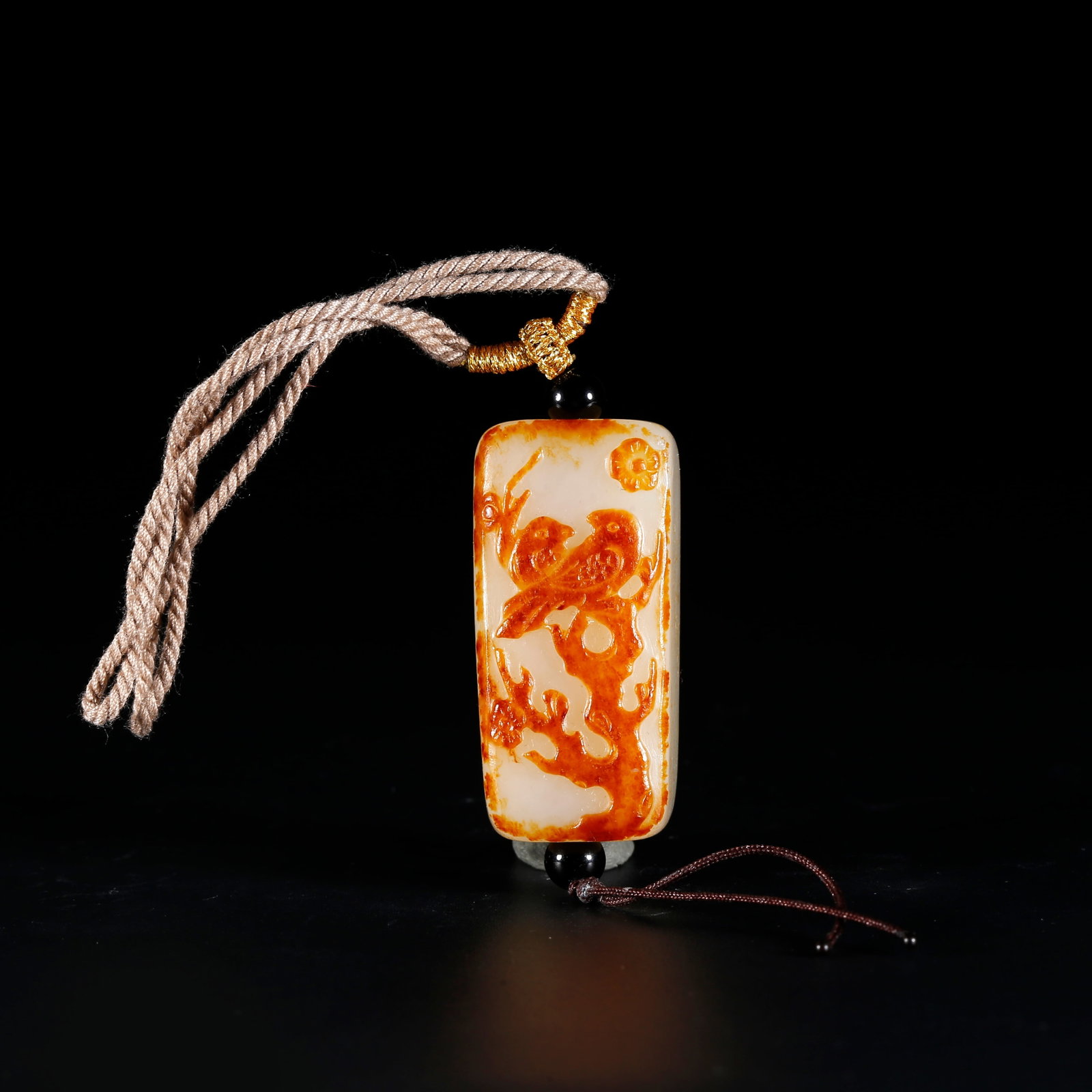 A HETIAN JADE PENDANT CARVED WITH FLOWER AND BIRD PATTERNS (1 of 9)