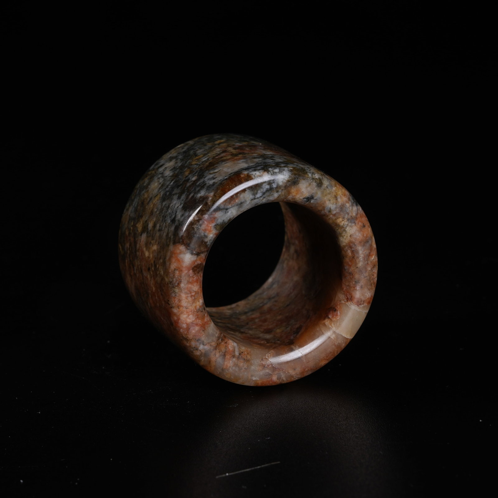 A ARCHAIC JADE THUMB RING - 9