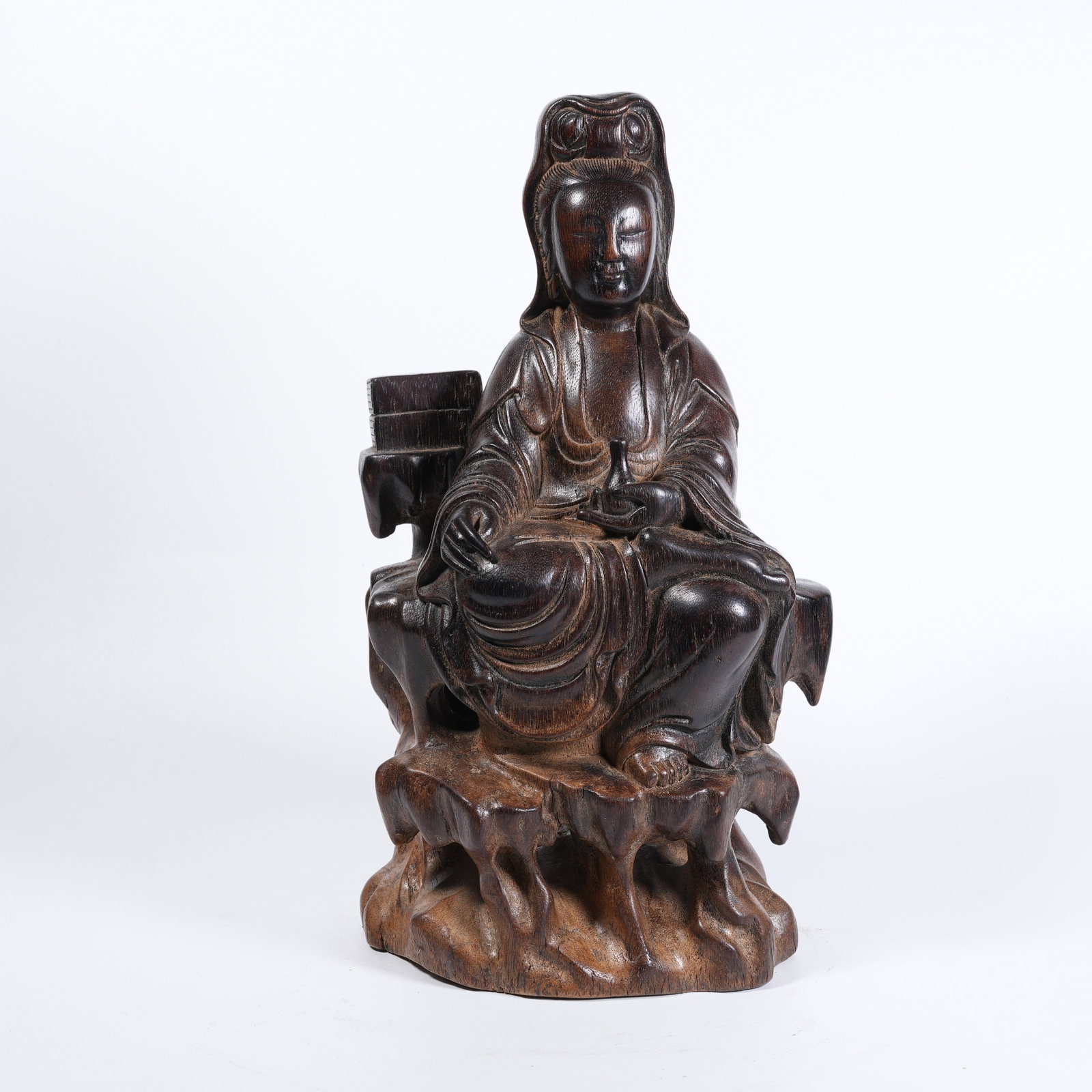 A AGARWOOD GUANYIN WITH HOLY-VASE STATUE: Agarwood Guanyin with holy-vase statue