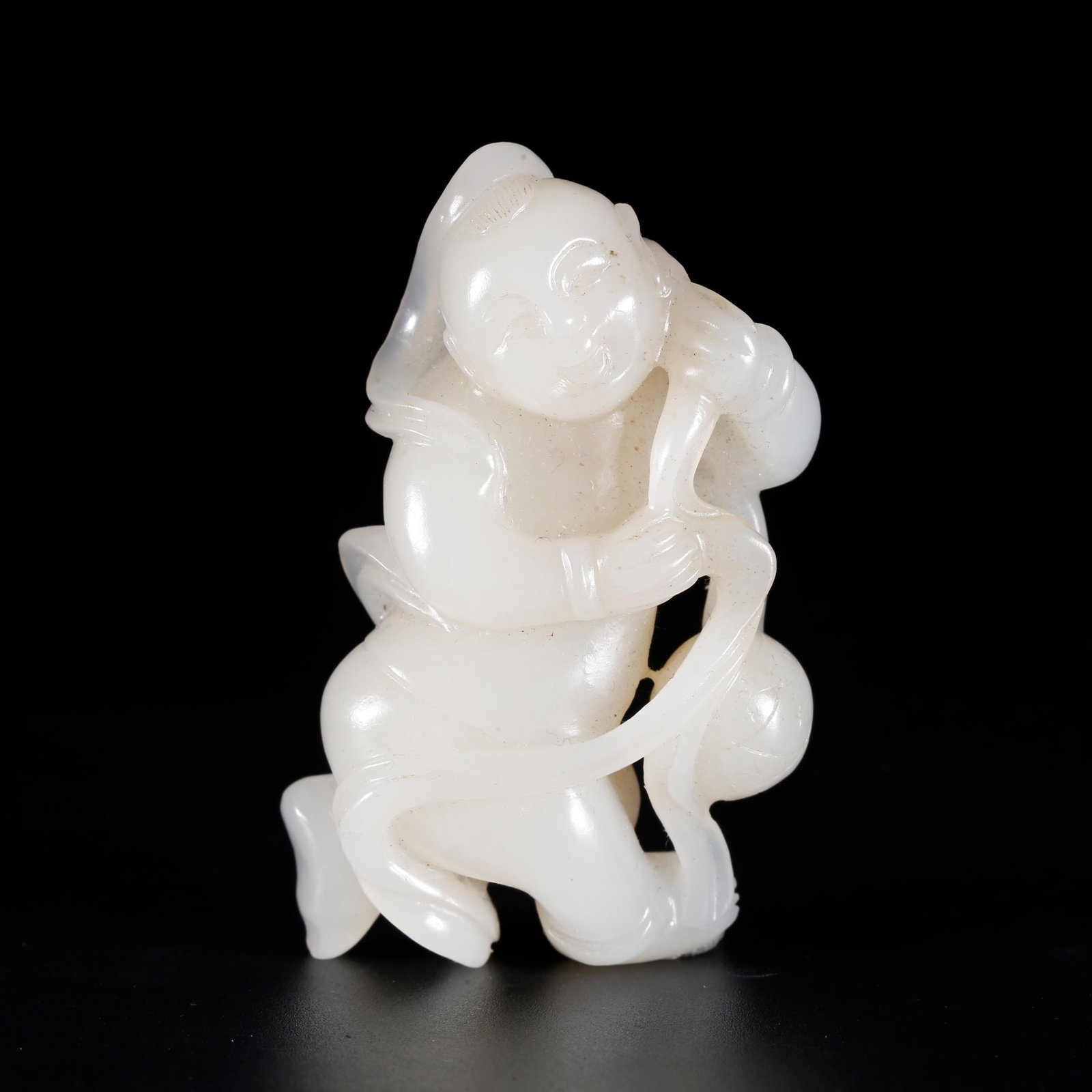 A HETIAN JADE ORNAMENT CARVED AS BOY (1 of 9)