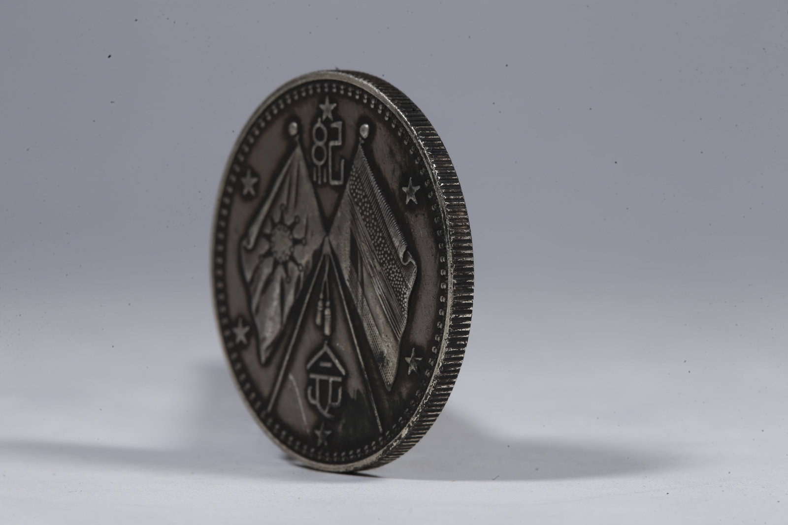 A SILVER DOLLAR COIN - 2