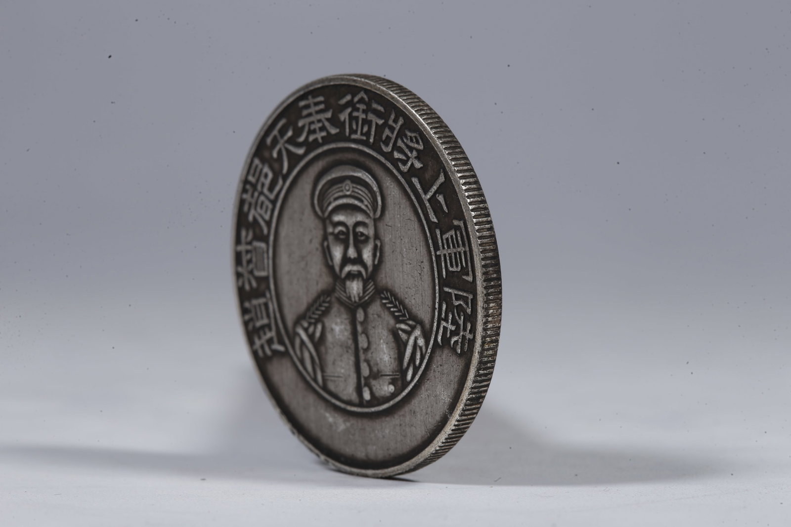 A SILVER DOLLAR COIN - 2