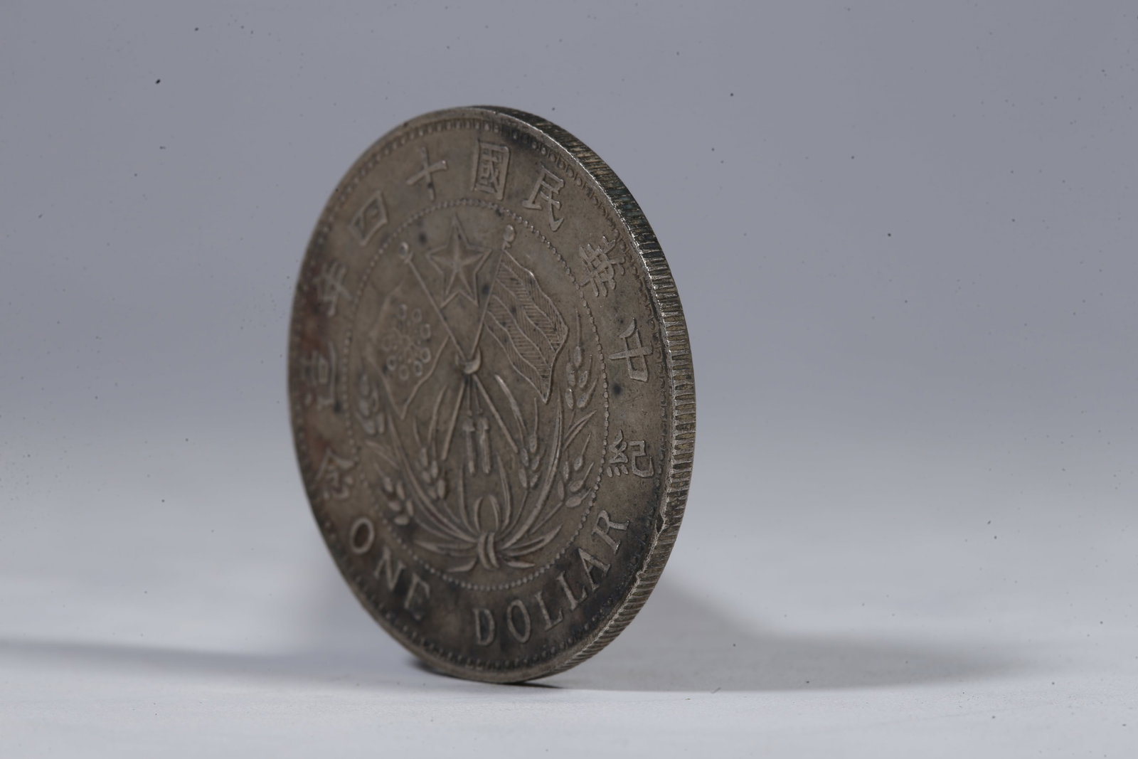 A SILVER DOLLAR COIN - 2
