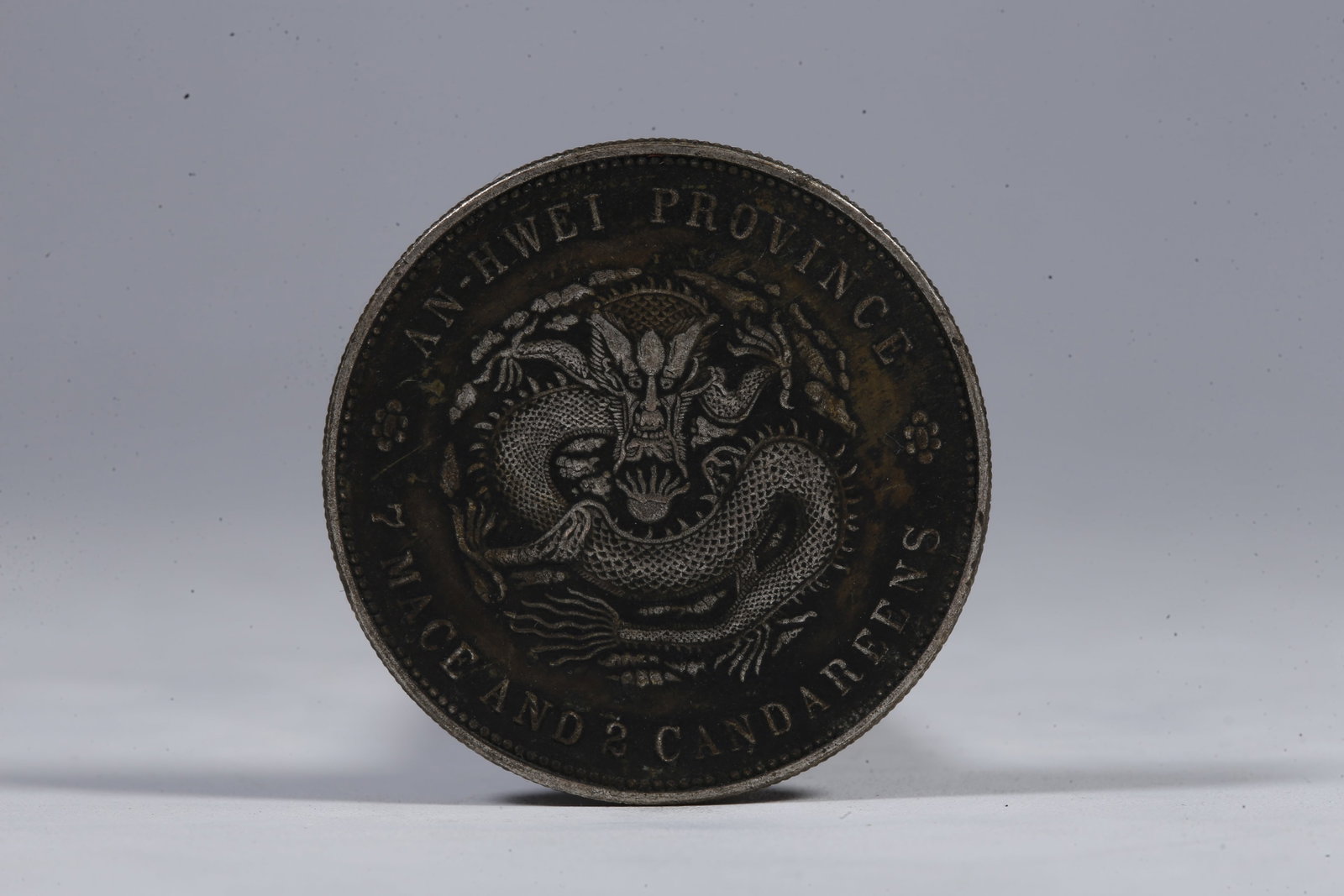 A SILVER DOLLAR COIN - 3
