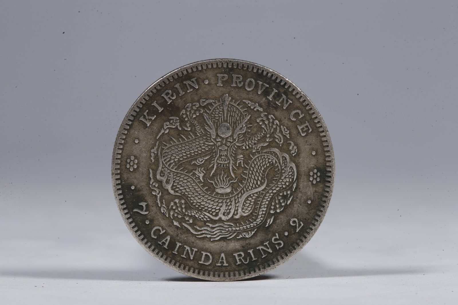 A SILVER DOLLAR COIN - 3