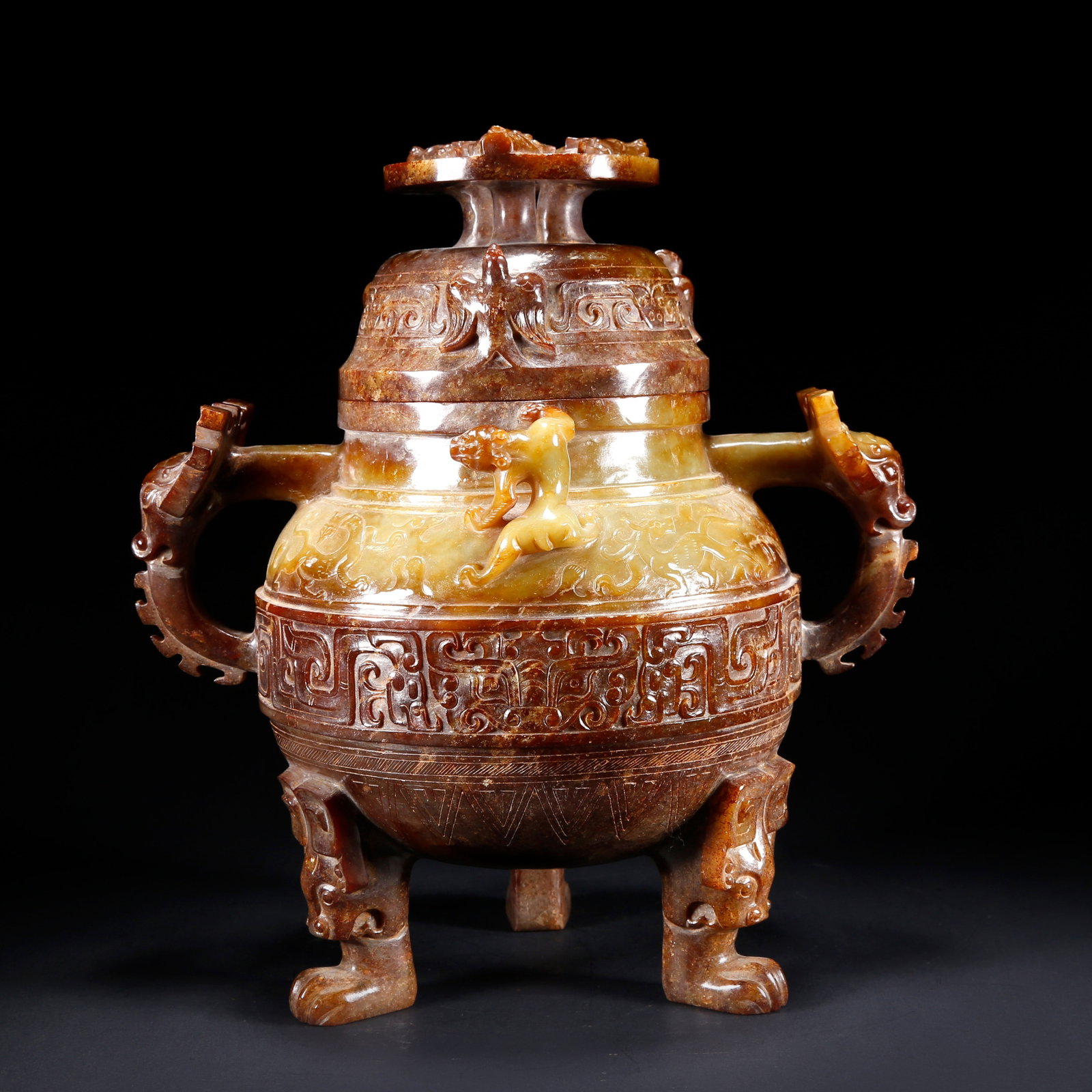 A HETIAN JADE THREE-LEGGED LIDDED CENSER CARVED WITH DRAGON AND PHOENIX PATTERN (1 of 9)