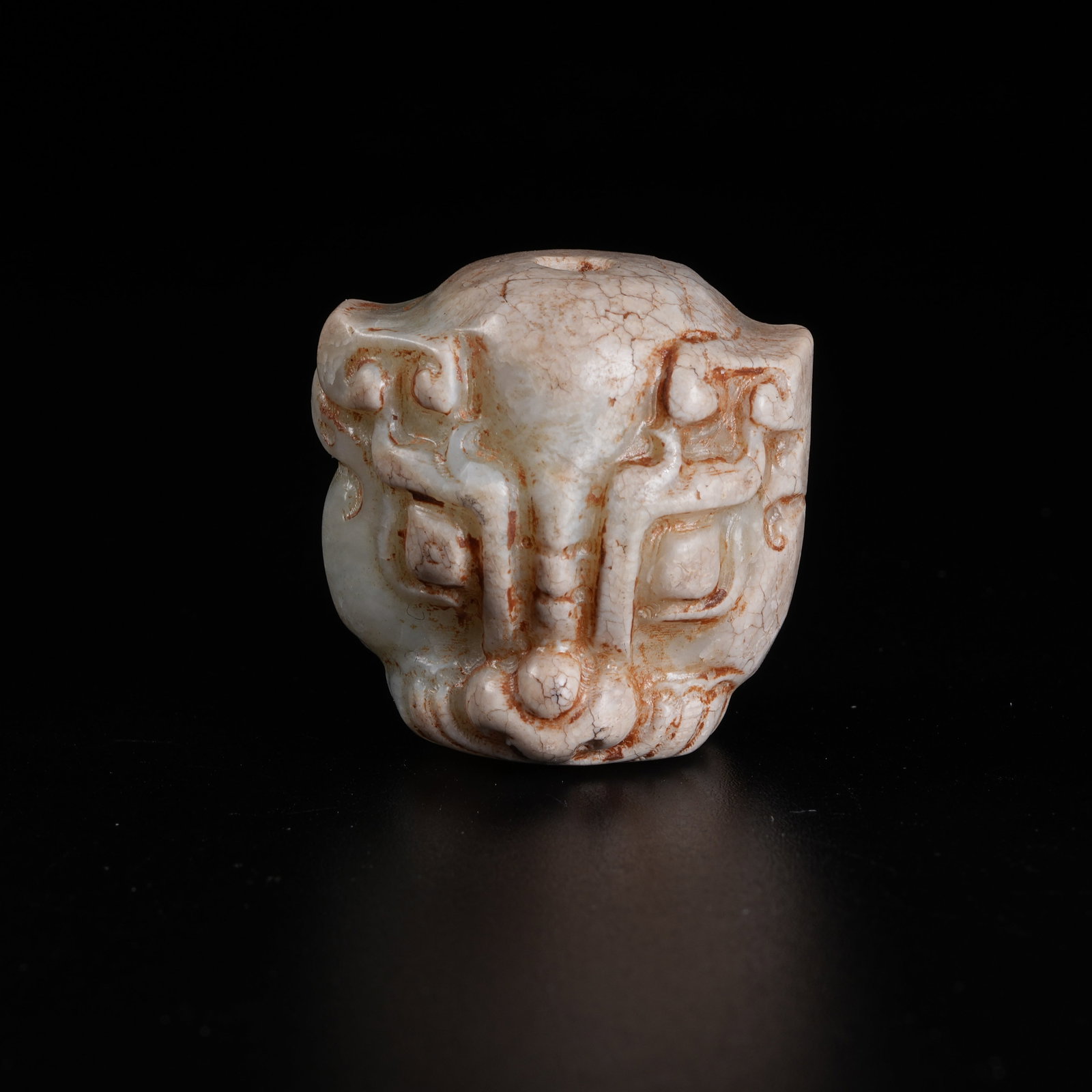 A ARCHAIC JADE BEAST MASK PENDANT: Archaic Jade Beast Mask Pendant
