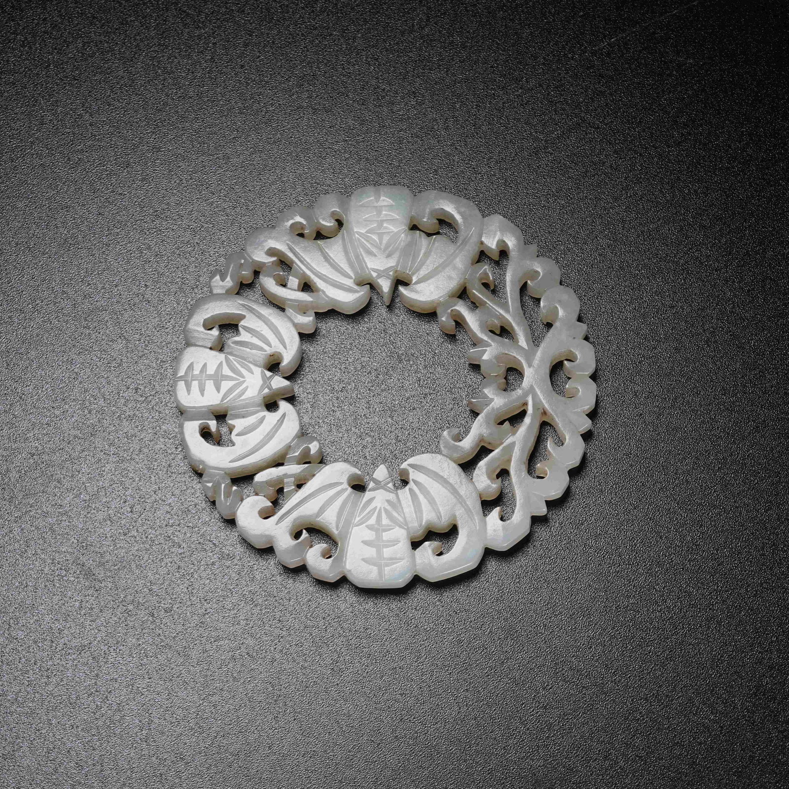 A HETIAN JADE FORTUNE PATTERN PENDANT (1 of 8)