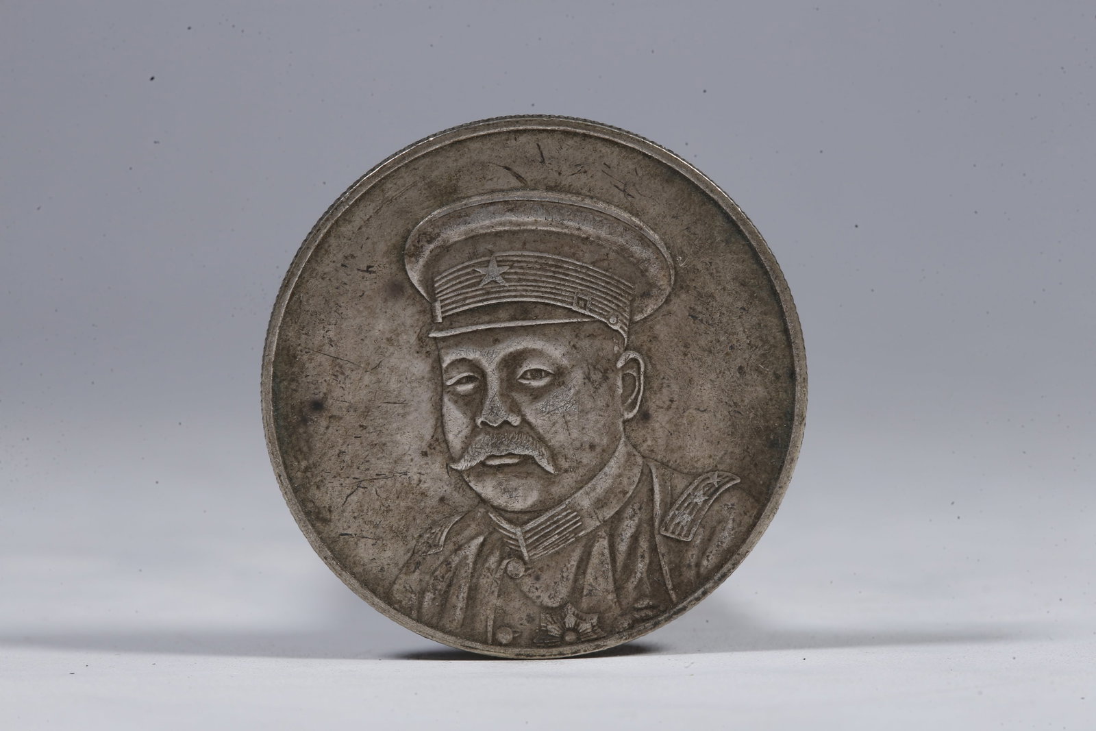 A SILVER DOLLAR COIN - 3