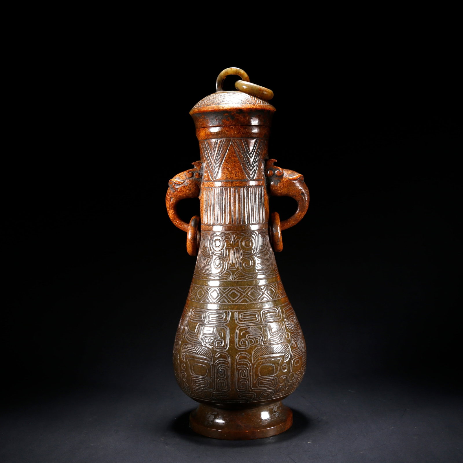 A ARCHAIC JADE LIDDED VASE WITH DOUBLE BEAST EARS (1 of 9)
