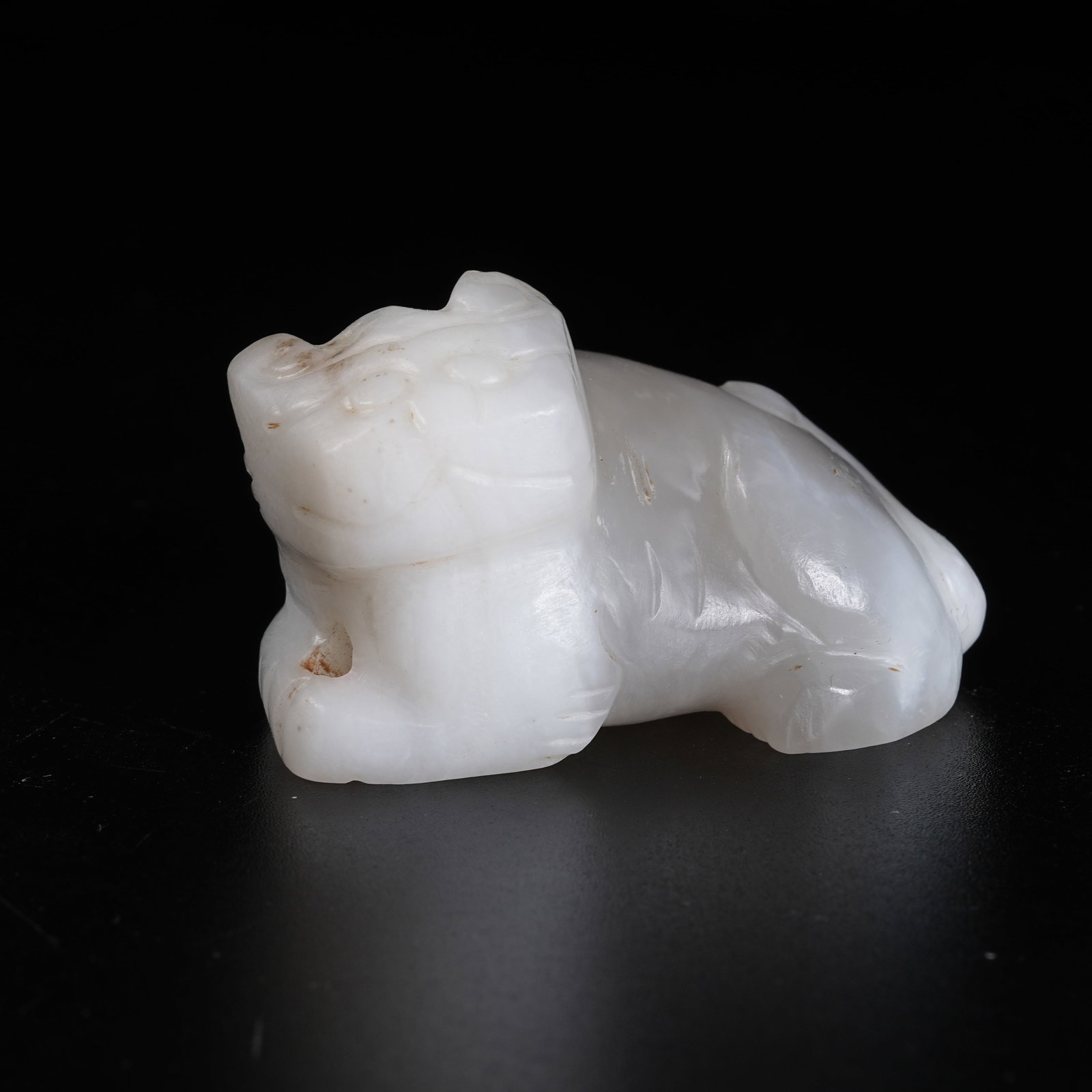 A ARCHAIC JADE RECUMBENT BEAST ORNAMENT: Archaic Jade Recumbent Beast Ornament