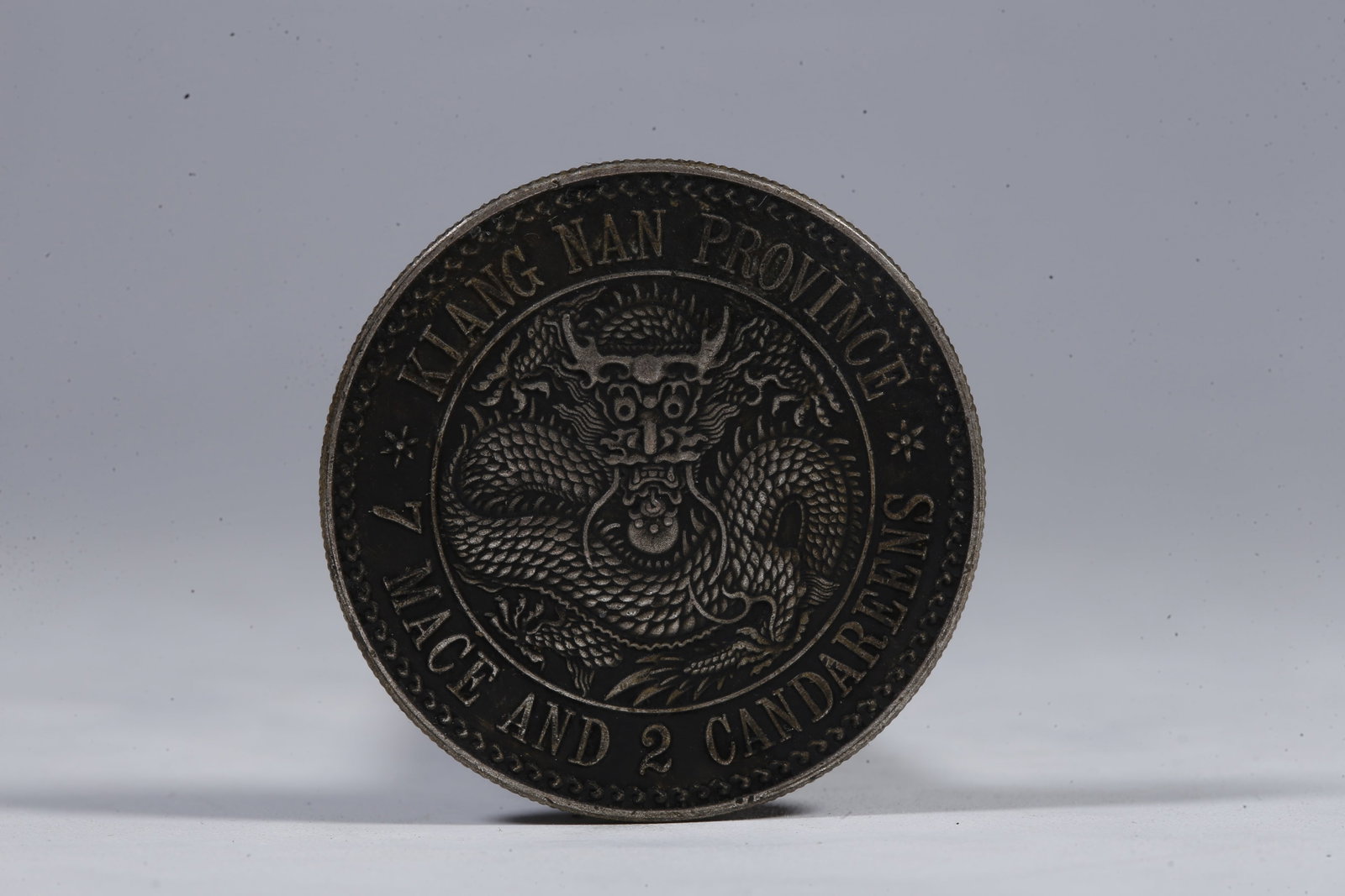 A SILVER DOLLAR COIN - 3