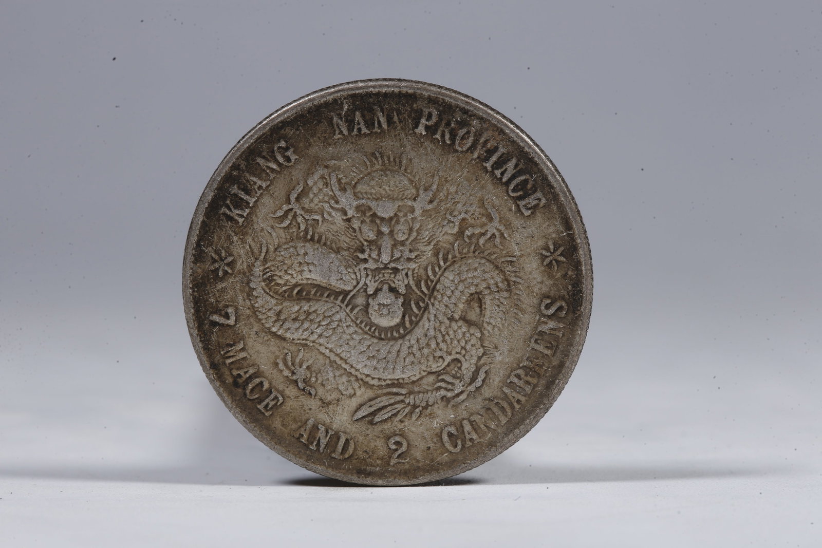 A SILVER DOLLAR COIN - 3