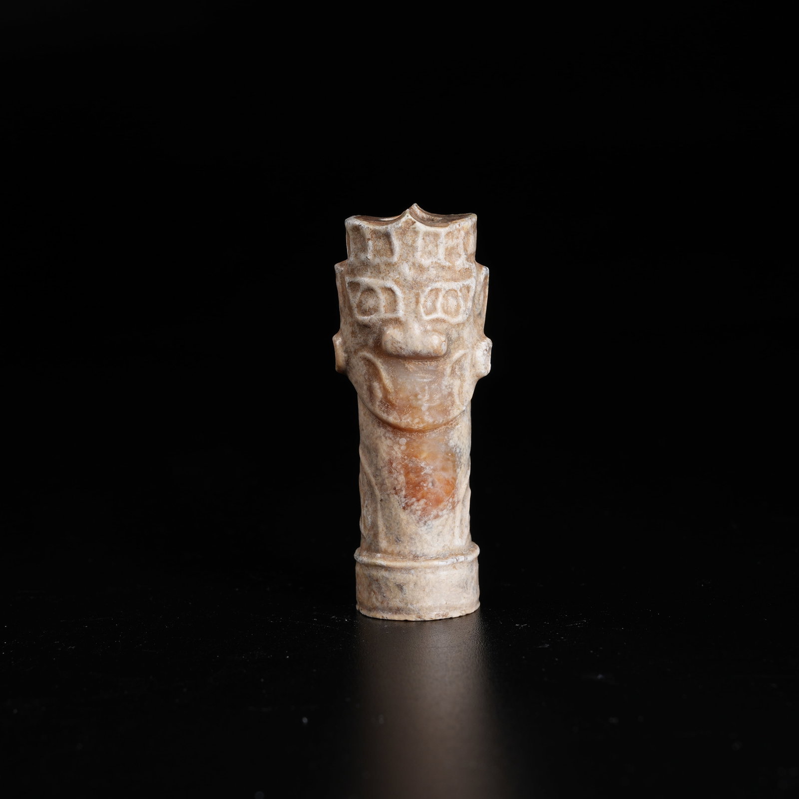 A ARCHAIC JADE DIVINE HUMAN FACE TUBE PENDANT: Archaic Jade Divine Human Face Tube Pendant