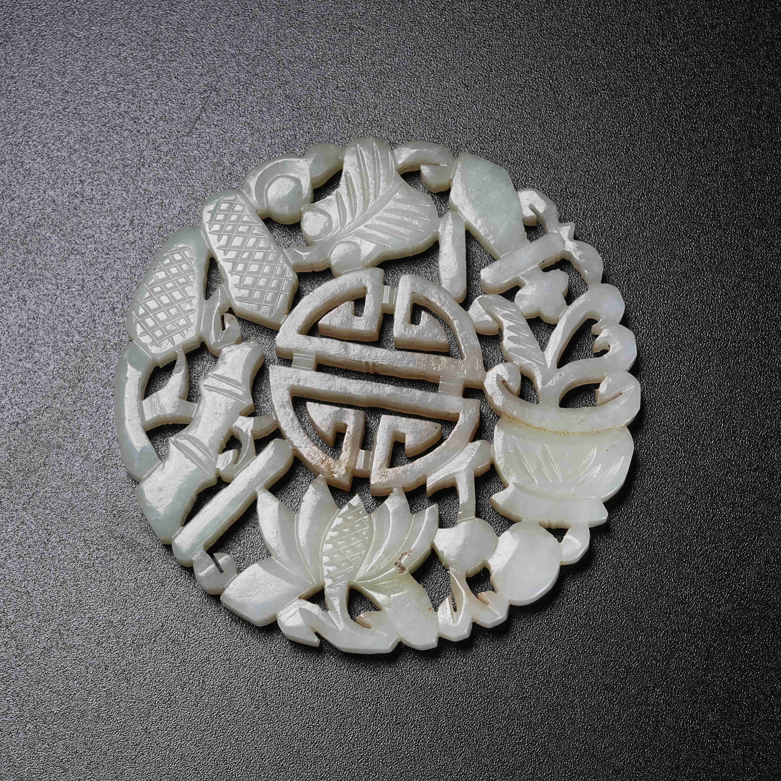 A HETIAN JADE LONGEVITY PATTERN PENDANT: Hetian Jade Longevity Pattern Pendant
