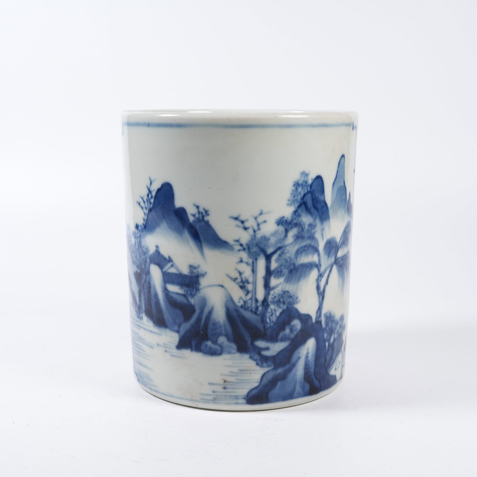 A BLUE AND WHITE BRUSH POT WITH LANDSCAPE, PAVILION AND TOWER PATTERN (1 of 9)