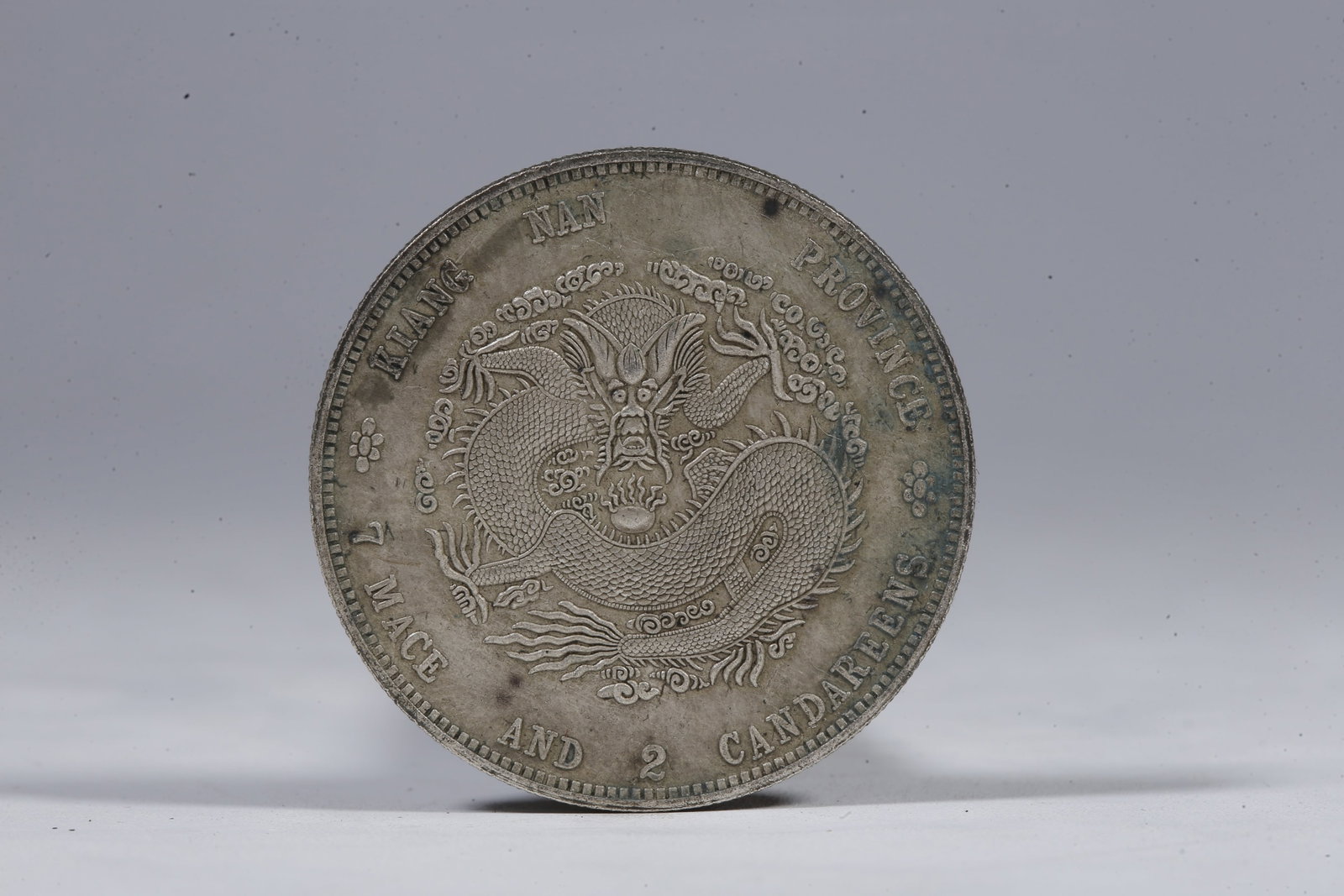 A SILVER DOLLAR COIN - 3