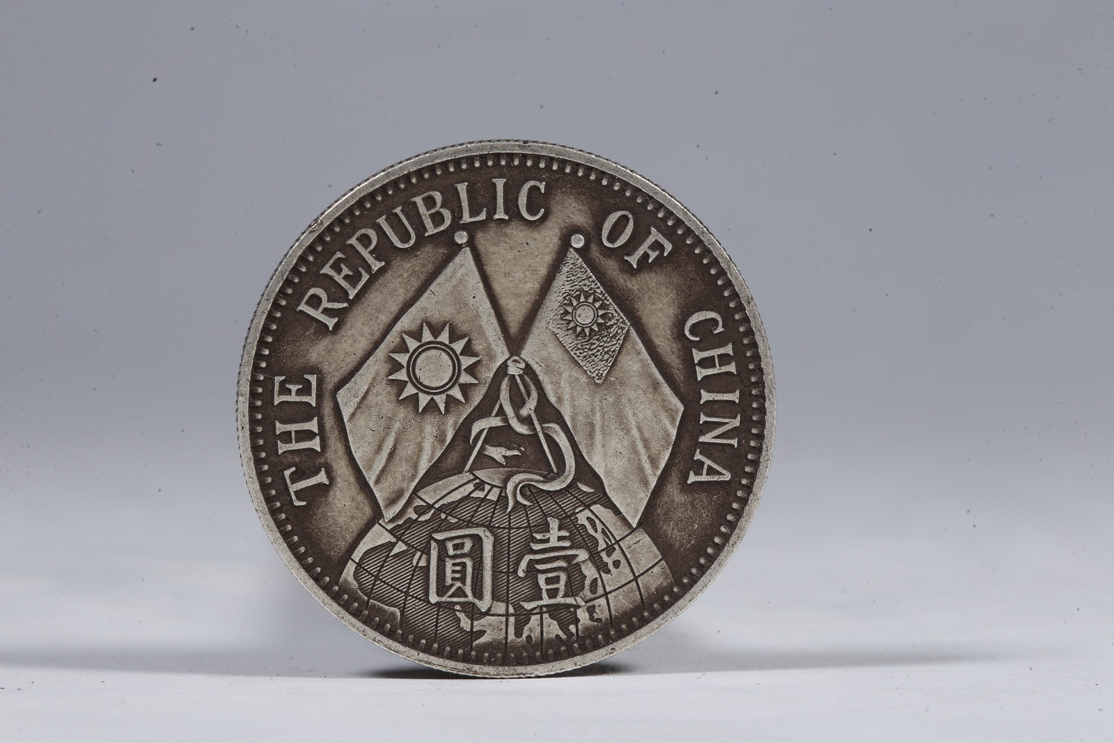 A SILVER DOLLAR COIN - 3