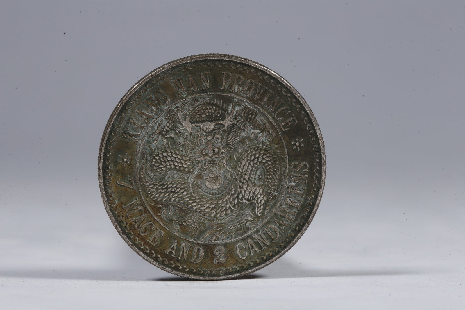A SILVER DOLLAR COIN - 3