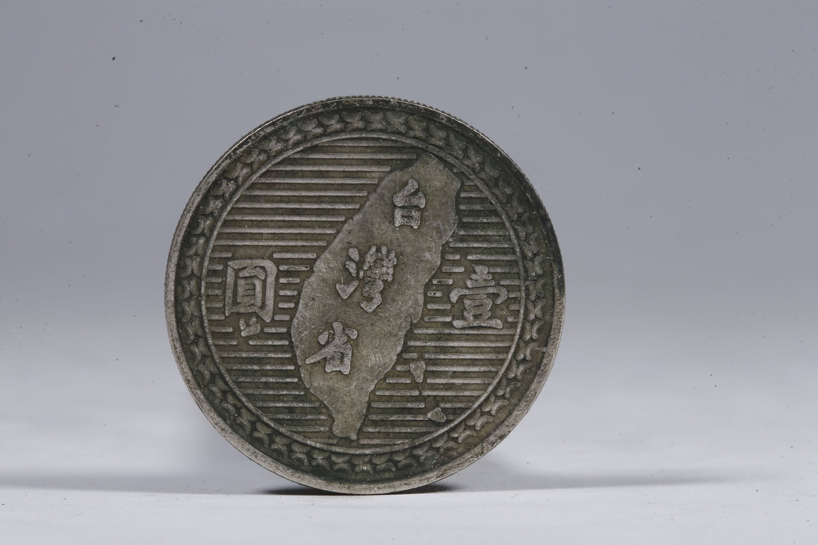 A SILVER DOLLAR COIN - 3