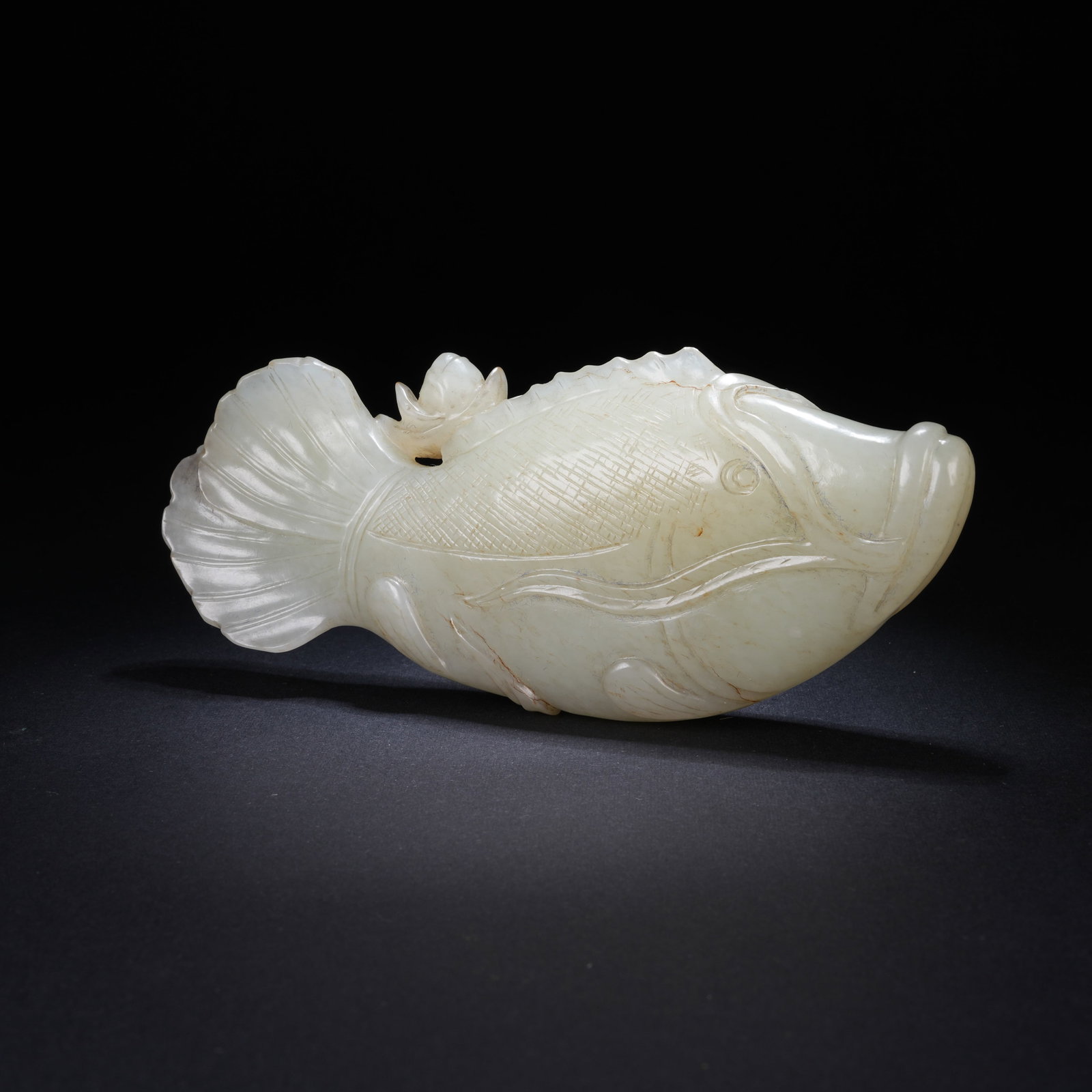 A HETIAN JADE FISH ORNAMENT