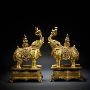 A PAIR OF GILTED BRONZE FIGURES OF ELEPHANT: H.36.5CM